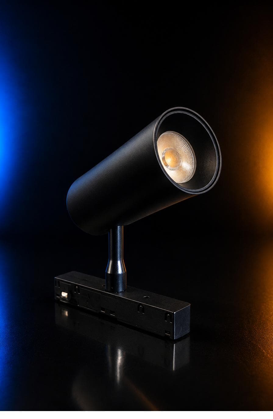 Magnetic Spot Light — black cylindrical gimbal spotlight on a magnetic track mount
