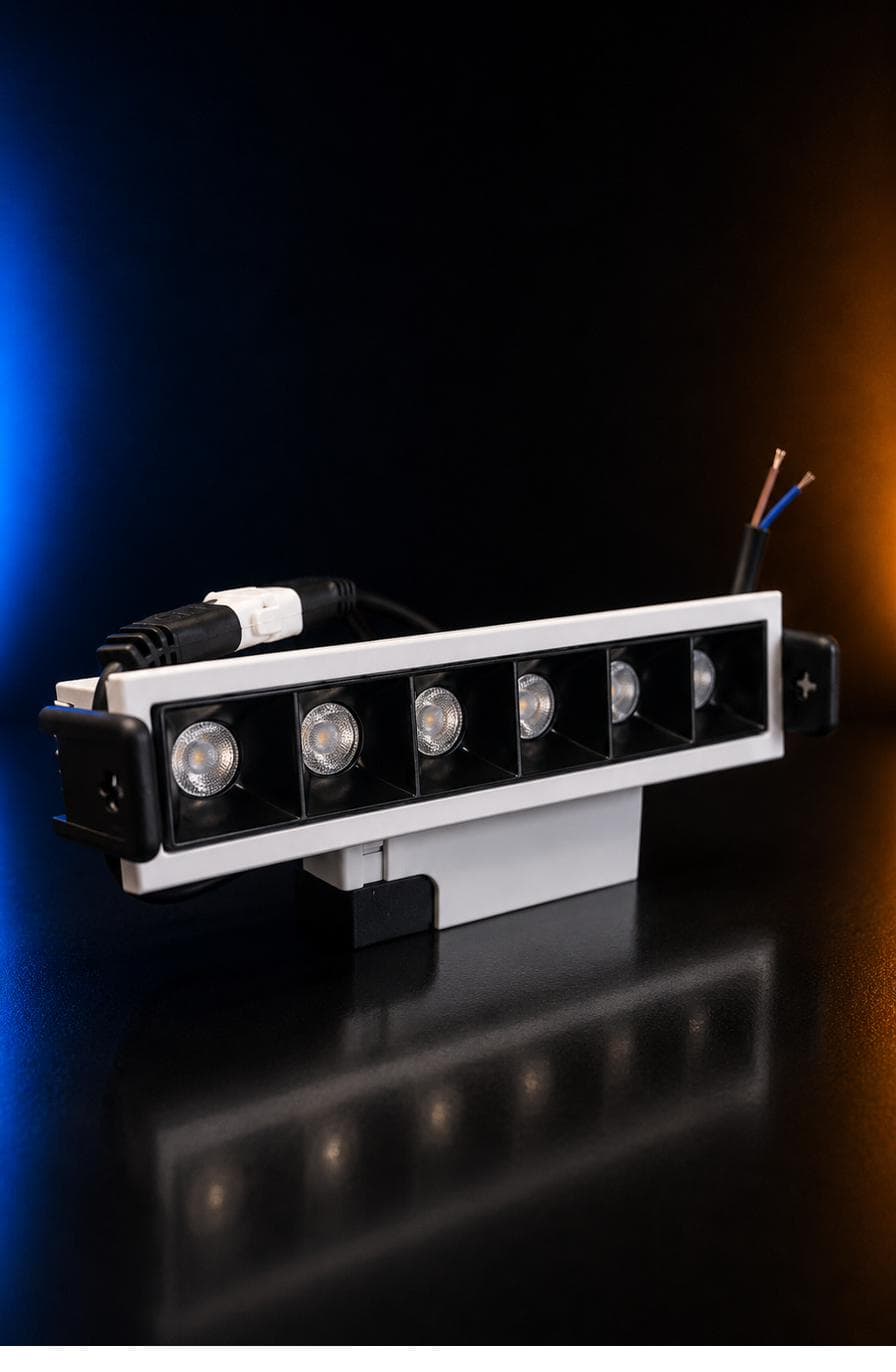 Laser Blade 6-Head — recessed linear luminaire with six lenses, white frame