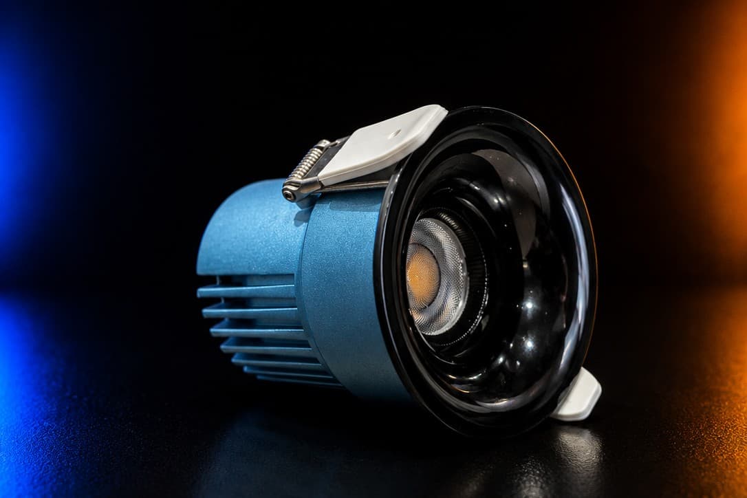 WW RD01 Recessed Downlight — blue anodized aluminium body with finned heatsink and black anti-glare lens
